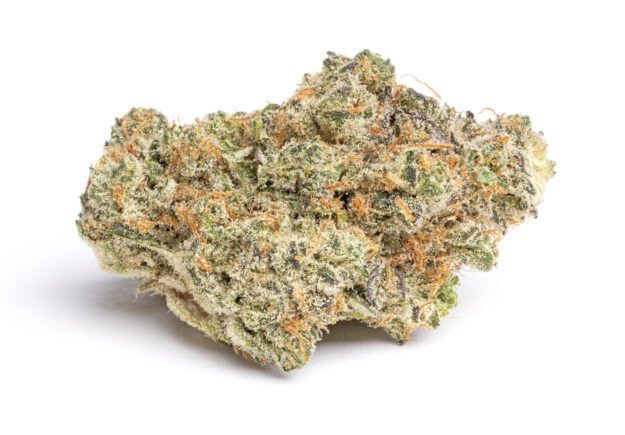 Tryiology-Og - Da Green Corner Weed Delivery Trilogy OG Boutique (TB) is a potent cannabis strain known for its earthy, piney aroma and relaxing effects. This indica-dominant hybrid features a blend of rich green buds covered in a thick layer of trichomes. The dense, compact flowers emit a subtle citrus scent mixed with earthy undertones, offering a calming and tranquil high. With its deep relaxation properties, TB is perfect for unwinding after a long day or managing stress. Ideal for evening use, this strain promotes restfulness while delivering a soothing body high.